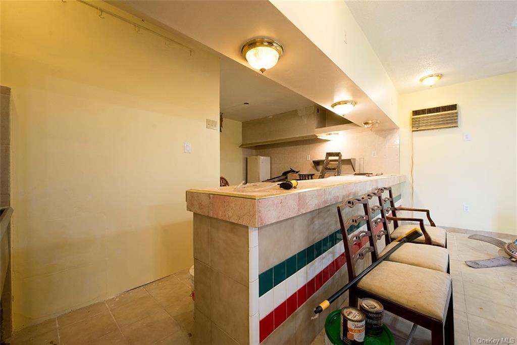 304 Wade Road Liberty, NY 12754 - Photo 7 of 35 a room with table and chairs