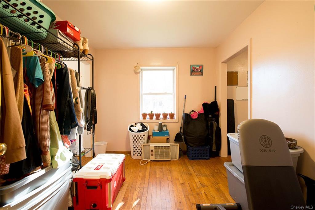 304 Wade Road Liberty, NY 12754 - Photo 9 of 35 a bed room with a bed and a window