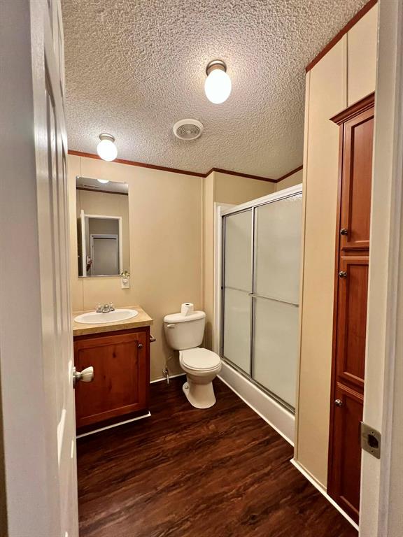 1085 Highland Circle Springtown, TX 76082 - Photo 18 of 30 a bathroom with a sink and a mirror