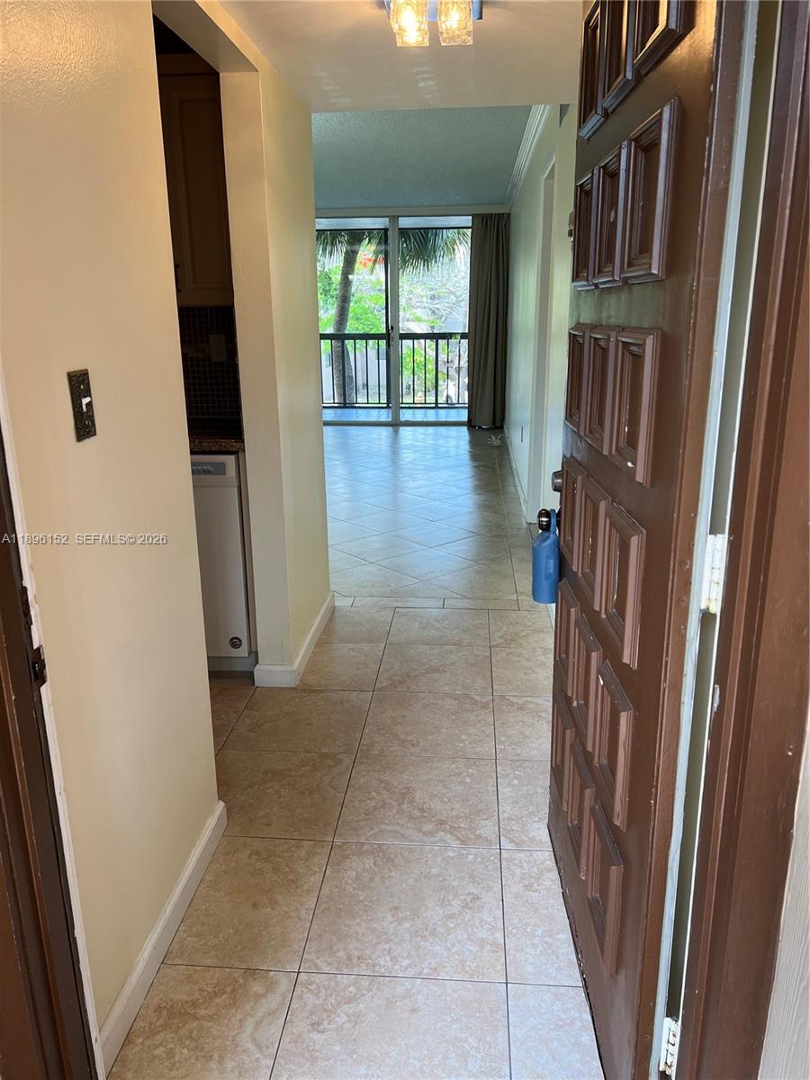 10855 Southwest 112th Avenue, Unit 215 Miami, FL 33176 - Photo 11 of 45 a view of an entryway door
