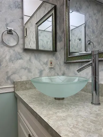 a view of swimming pool with outdoor seating and yard