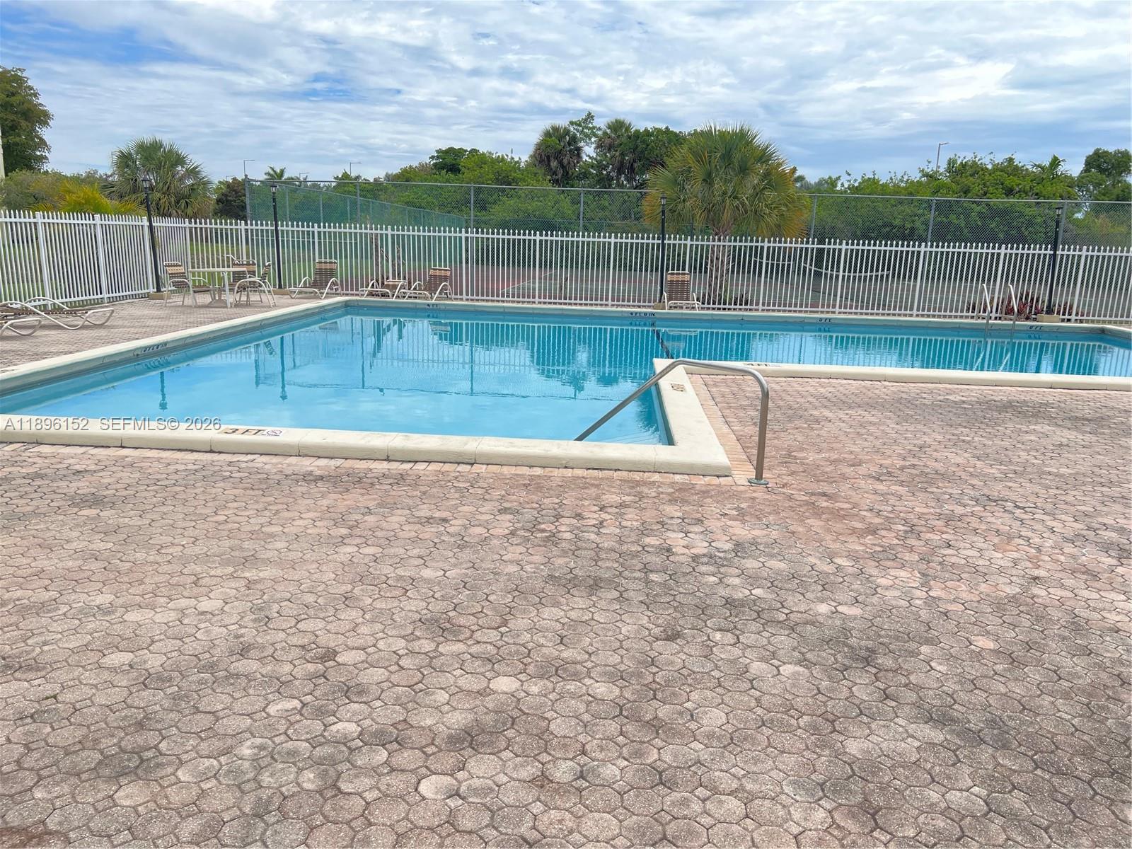 10855 Southwest 112th Avenue, Unit 215 Miami, FL 33176 - Photo 35 of 45 a view of a backyard