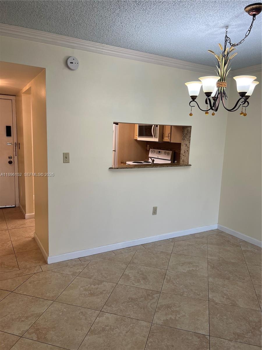 10855 Southwest 112th Avenue, Unit 215 Miami, FL 33176 - Photo 43 of 45 a view of kitchen and living room