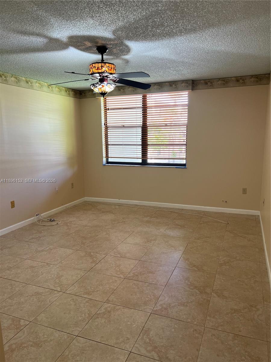 10855 Southwest 112th Avenue, Unit 215 Miami, FL 33176 - Photo 8 of 45 a view of empty room and window