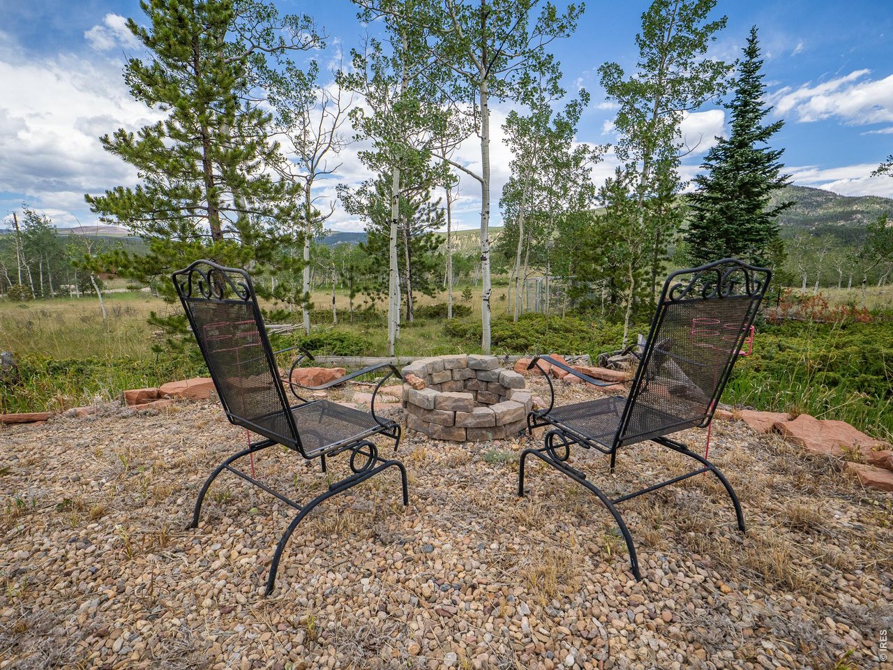 Gather round the firepit and enjoy the views from your own camp site.