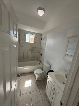 a view of an entryway with white walls