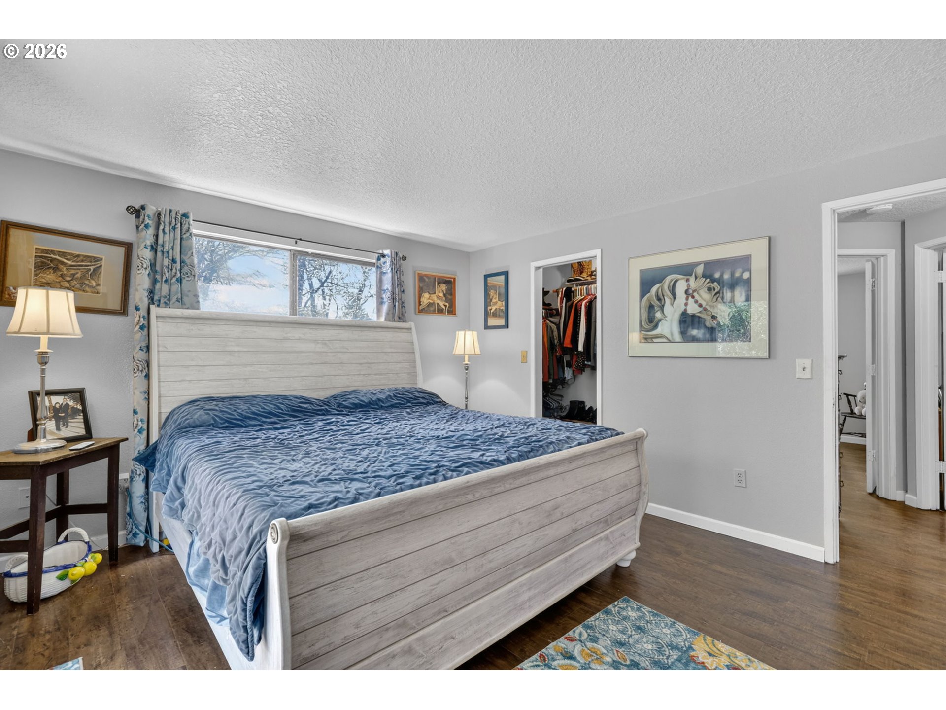 21155 Southeast Foster Road Damascus, OR 97089 - Photo 21 of 48 a bedroom with a bed and a desk