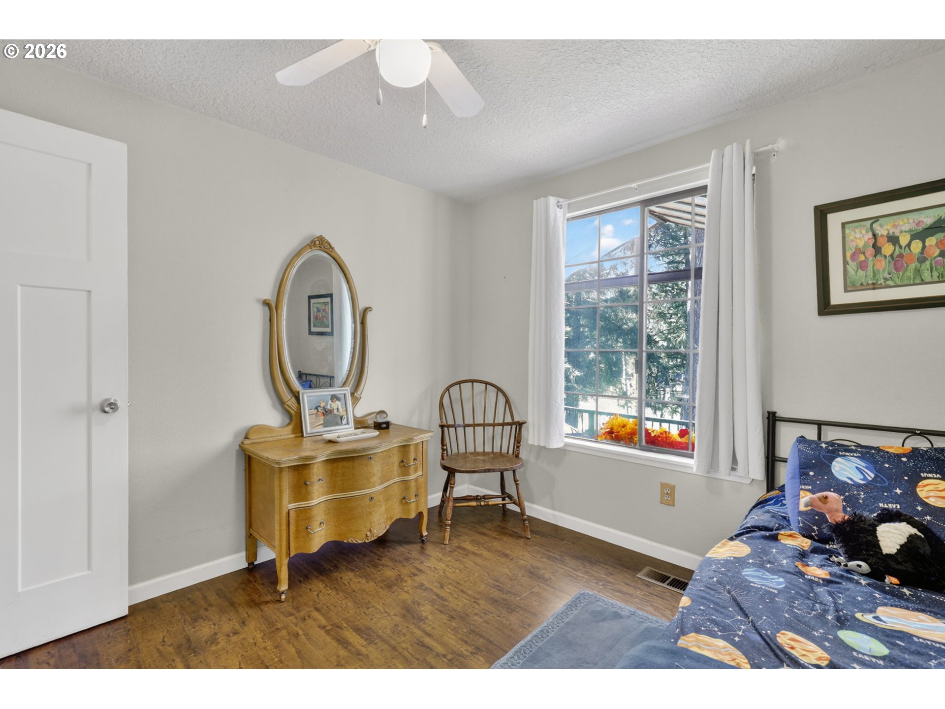 21155 Southeast Foster Road Damascus, OR 97089 - Photo 26 of 48 a living room with furniture and a window