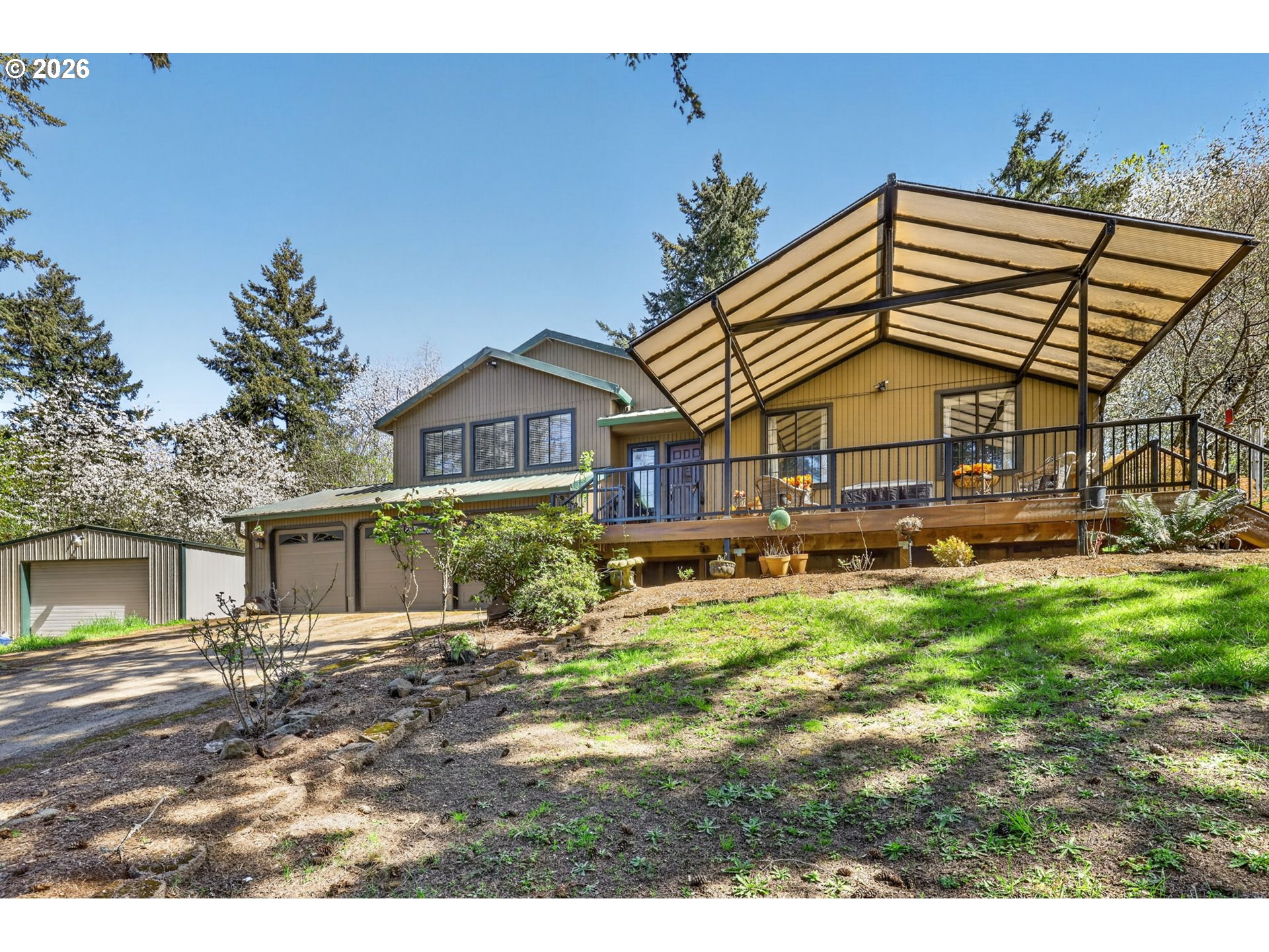 21155 Southeast Foster Road Damascus, OR 97089 - Photo 3 of 48 a front view of a house with a yard