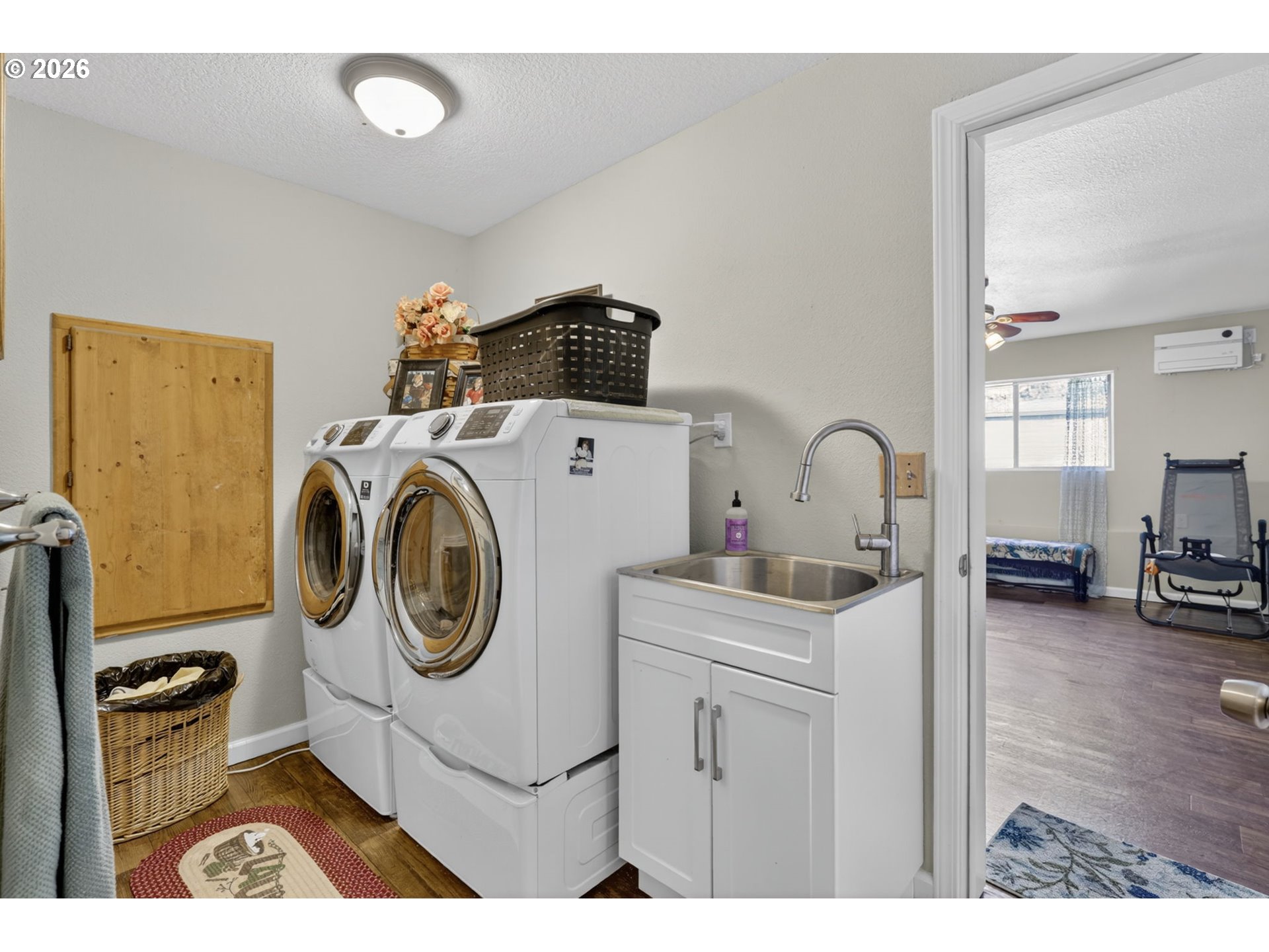 21155 Southeast Foster Road Damascus, OR 97089 - Photo 32 of 48 a utility room with sink dryer and washer