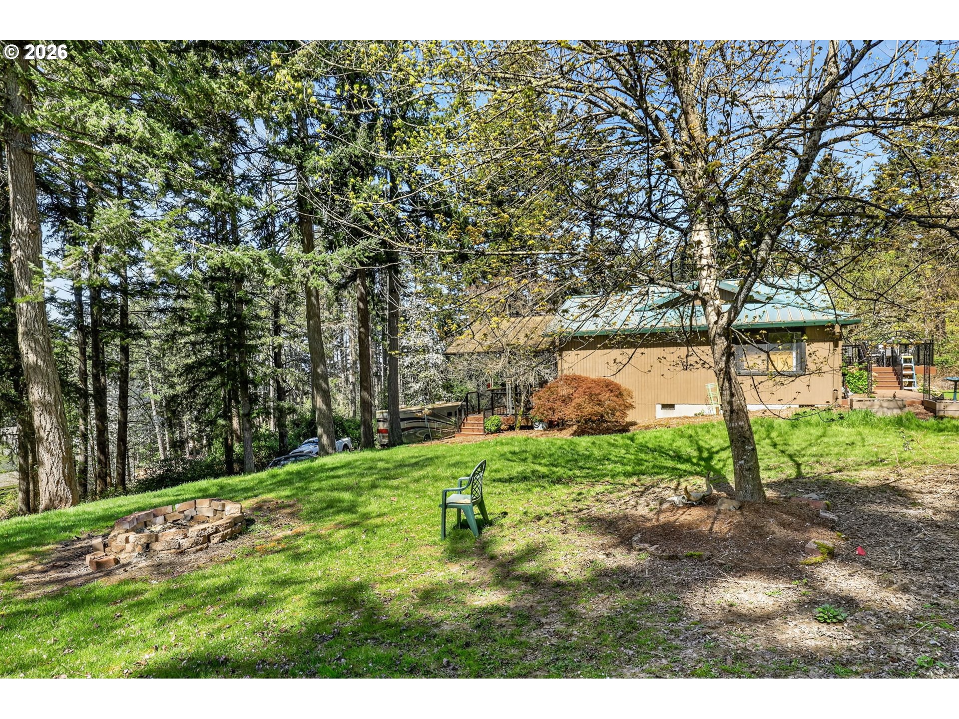 21155 Southeast Foster Road Damascus, OR 97089 - Photo 43 of 48 a backyard of a house with a yard and outdoor seating