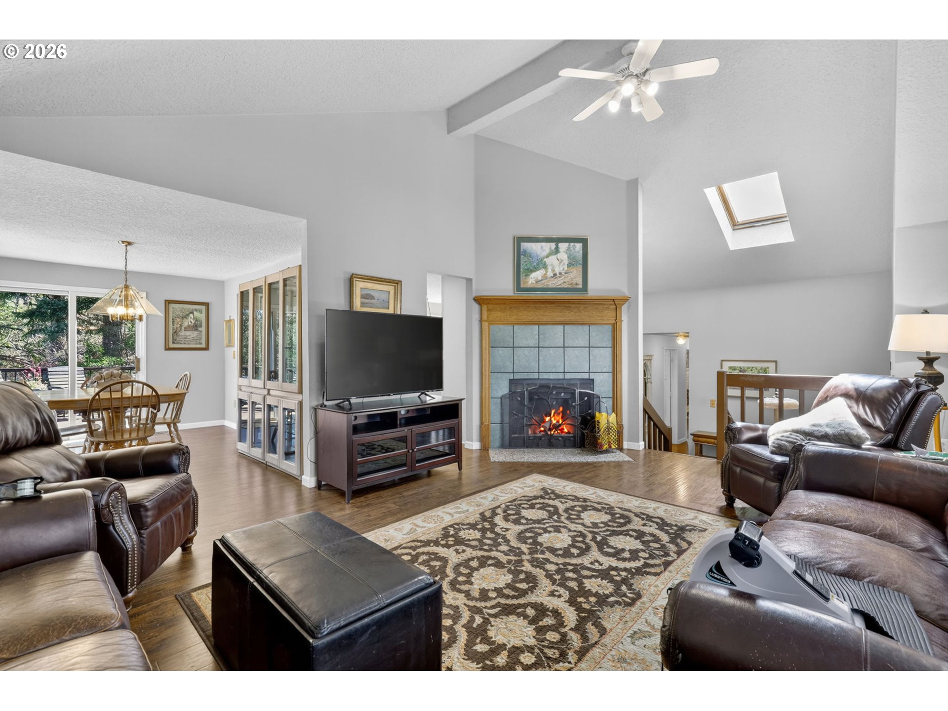 21155 Southeast Foster Road Damascus, OR 97089 - Photo 10 of 48 a living room with furniture and a flat screen tv