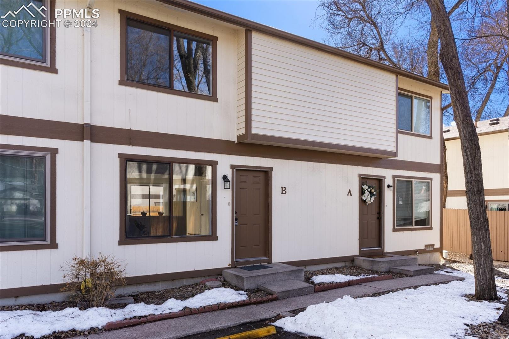 773 Alexander Road, Unit B Colorado Springs, CO 80909 - Photo 1 of 16 View of front of house