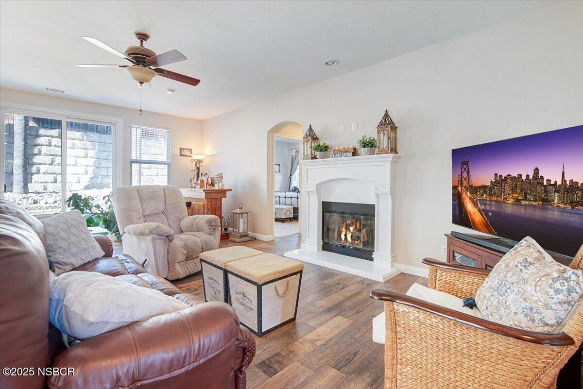 561 Andromeda Drive Lompoc, CA 93436 - Photo 12 of 54 a living room with furniture fireplace and window
