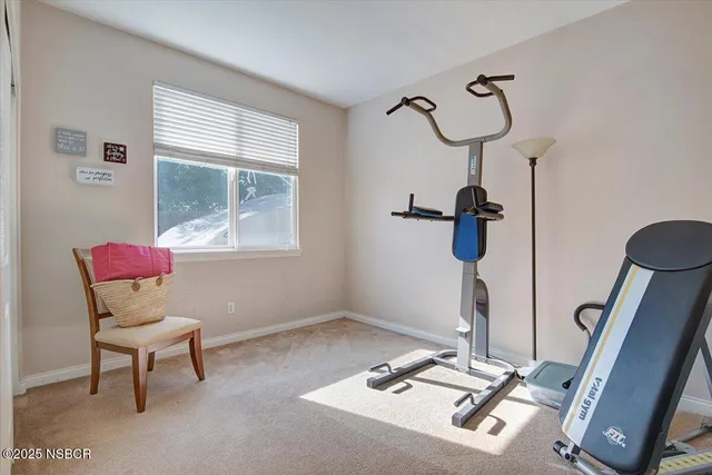 a view of a hallway with windows