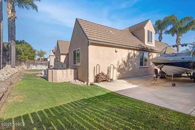 a backyard of a house with lots of green space