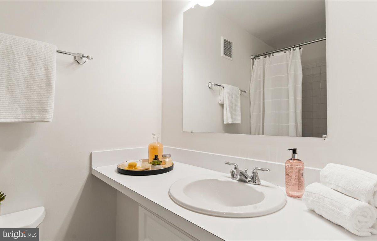1631 Valencia Way Reston, VA 20190 - Photo 24 of 42 Another full bath for bedrooms 2 and 3