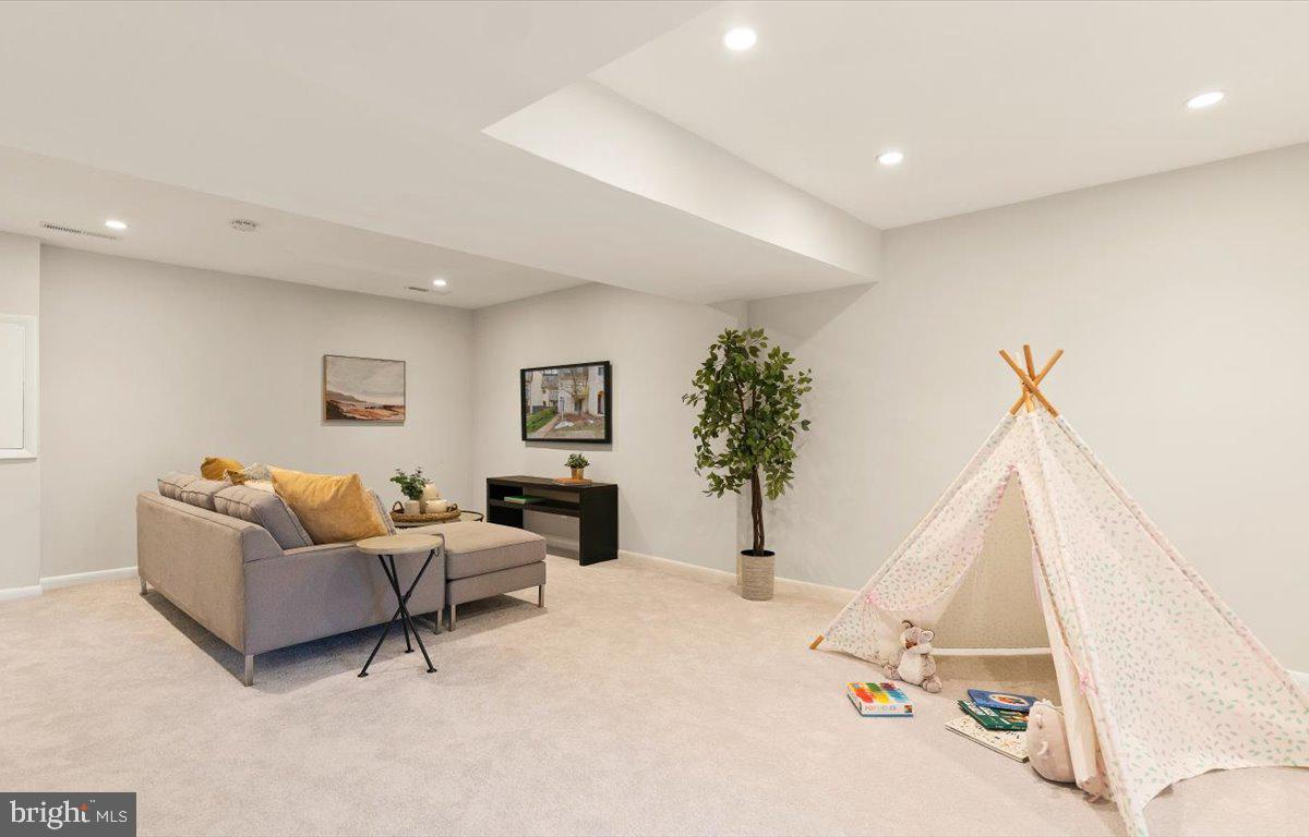1631 Valencia Way Reston, VA 20190 - Photo 26 of 42 Bright basement with recessed lighting!
