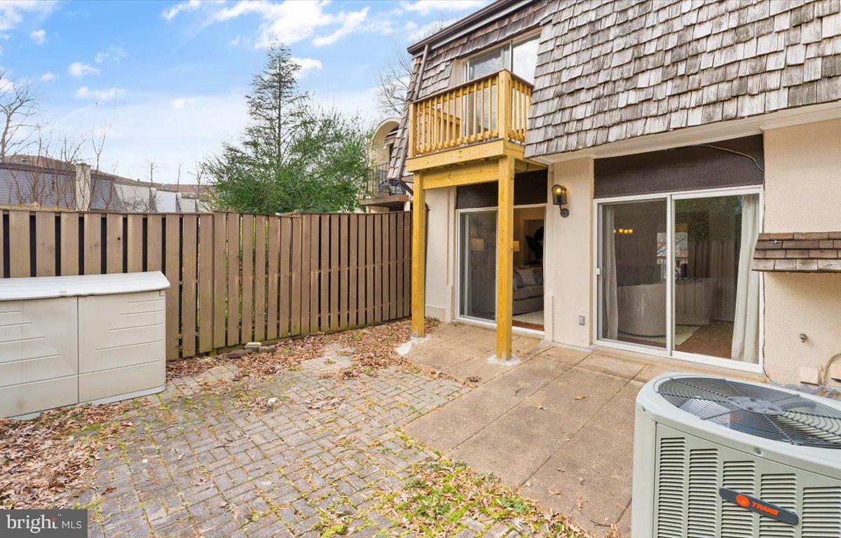 1631 Valencia Way Reston, VA 20190 - Photo 35 of 42 Balcony from primary room overlooks yard