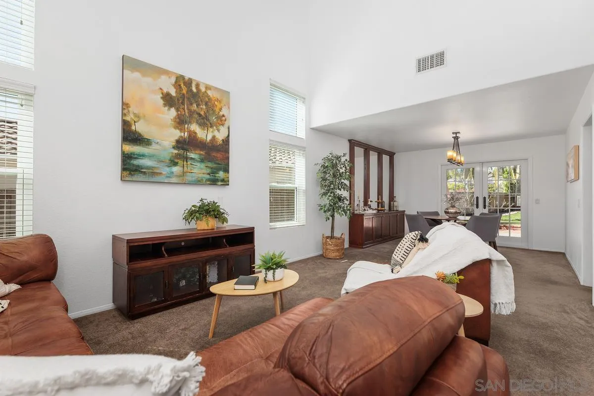 2016 Sequoia Street San Marcos, CA 92078 - Photo 11 of 50 a living room with furniture and a flat screen tv