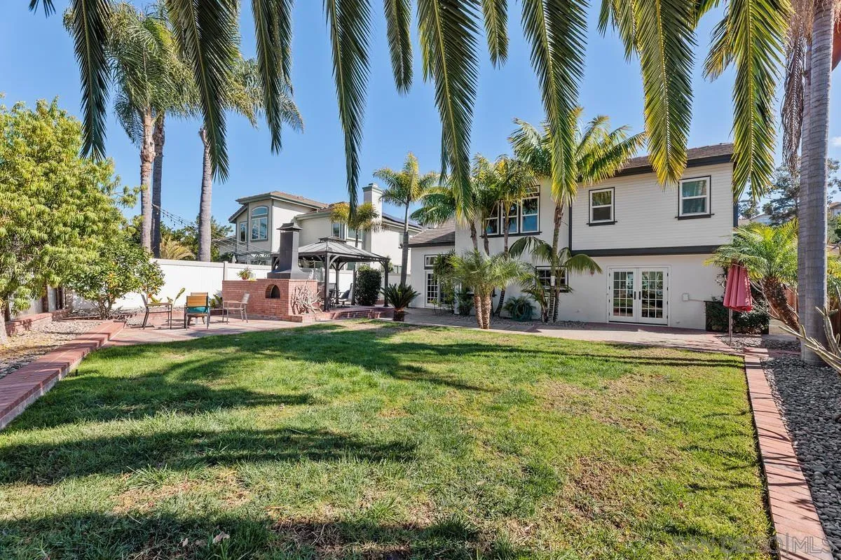 2016 Sequoia Street San Marcos, CA 92078 - Photo 38 of 50 a view of a swimming pool with a garden