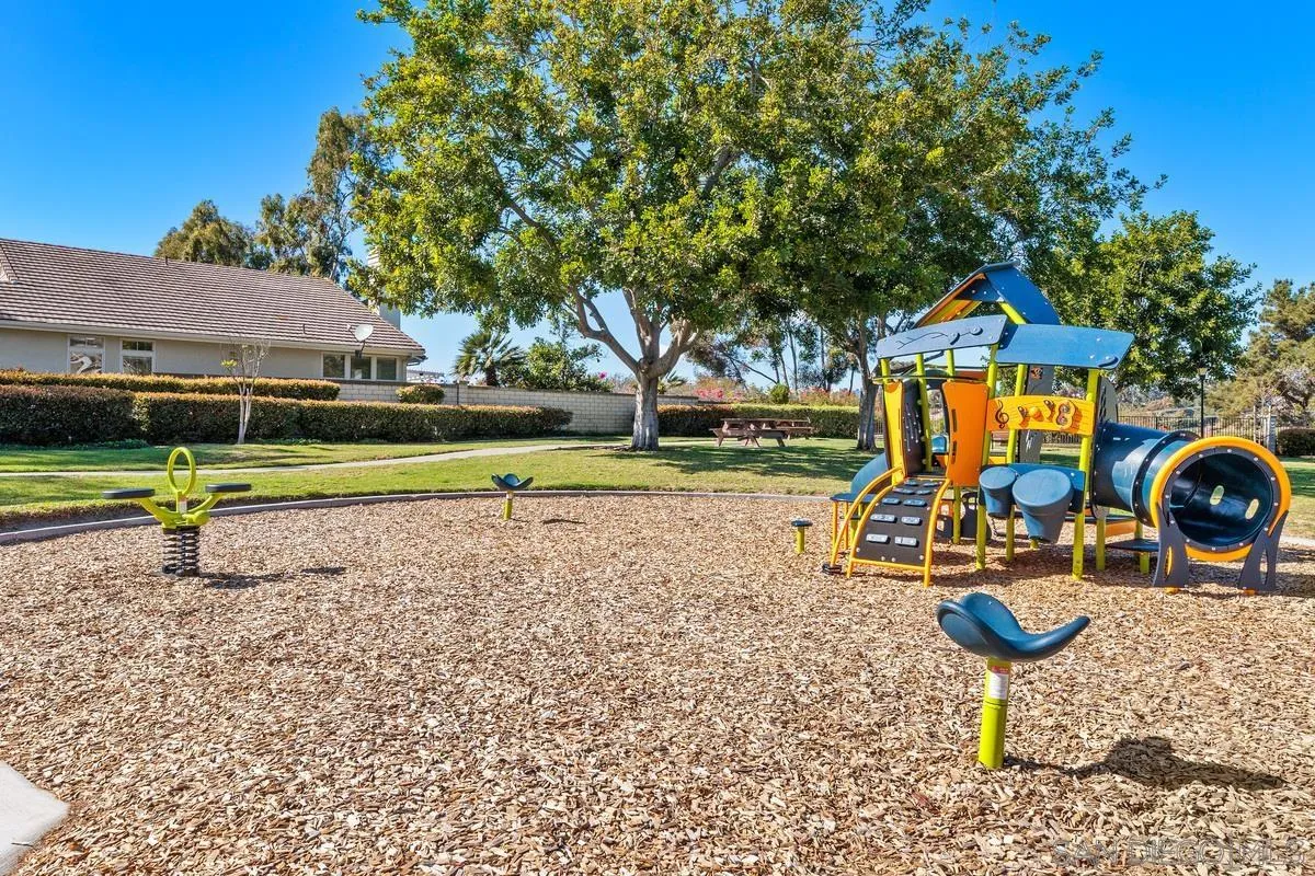 2016 Sequoia Street San Marcos, CA 92078 - Photo 48 of 50 a front view of a house with garden and trees