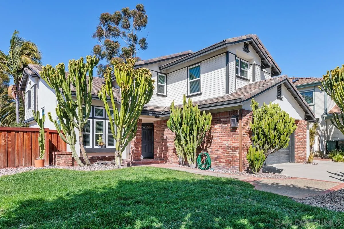 2016 Sequoia Street San Marcos, CA 92078 - Photo 6 of 50 a front view of a house with garden