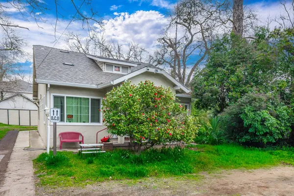 a view of a house with a garden