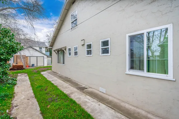 a front view of a house with yard