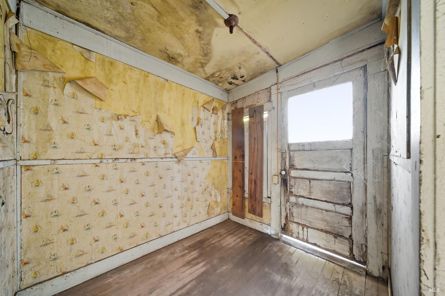 226 Bayview Street San Rafael, CA 94901 - Photo 19 of 57 a view of walk in closet with wooden floor