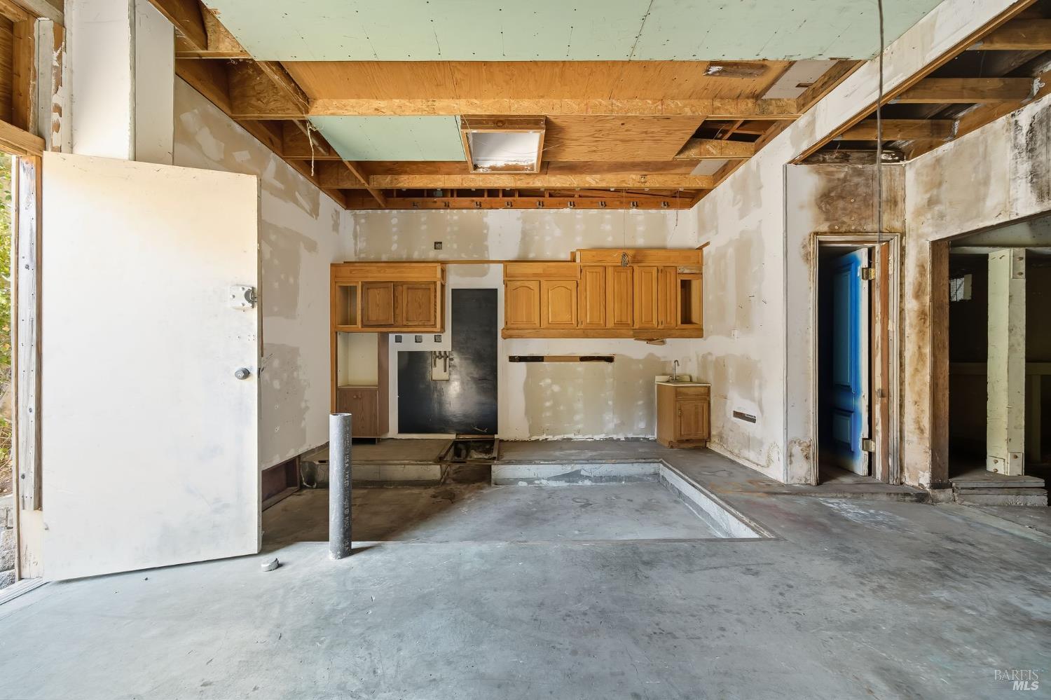 226 Bayview Street San Rafael, CA 94901 - Photo 24 of 56 a view of a hallway with wooden cabinets