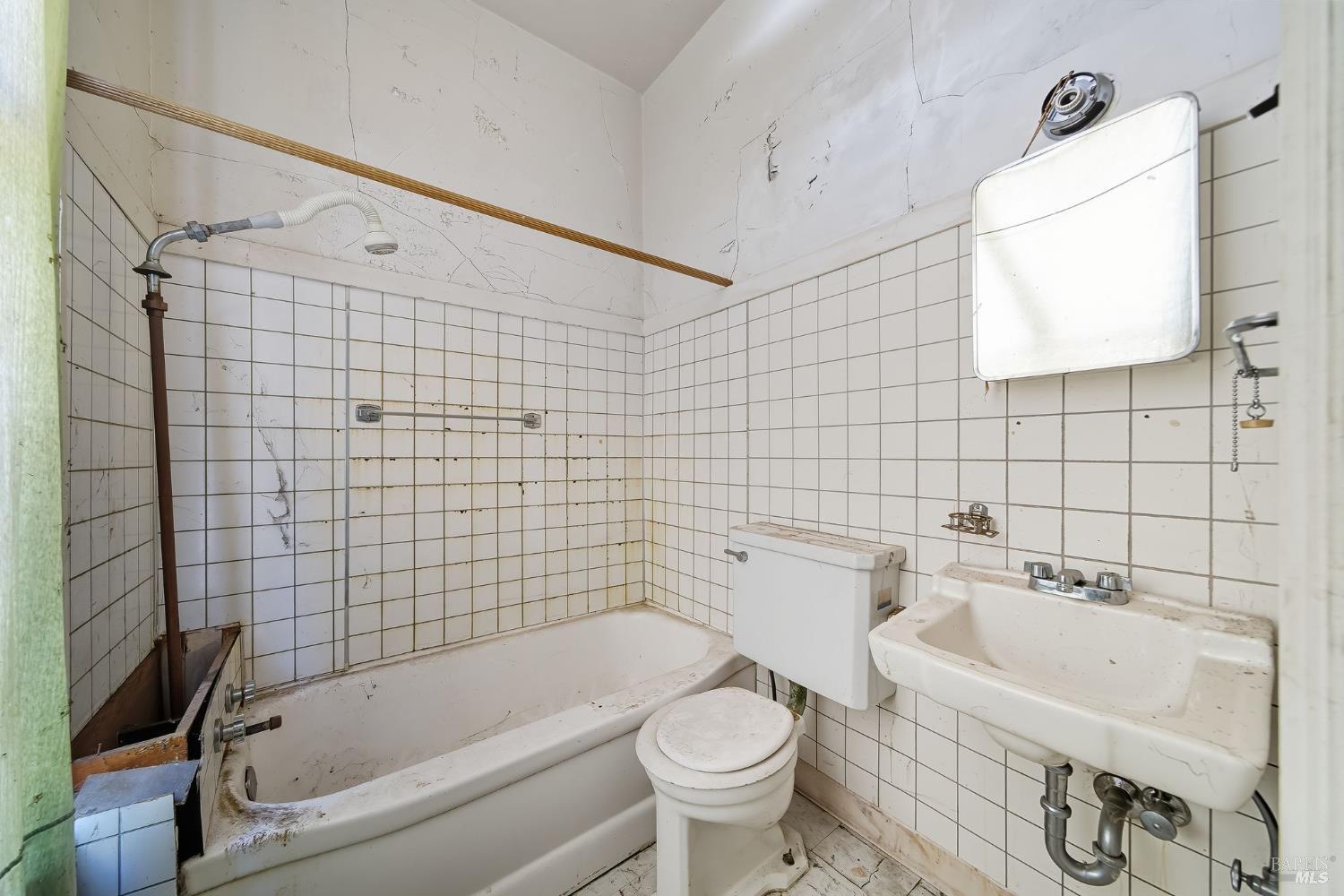 226 Bayview Street San Rafael, CA 94901 - Photo 41 of 56 a bathroom with a sink a toilet and bathtub