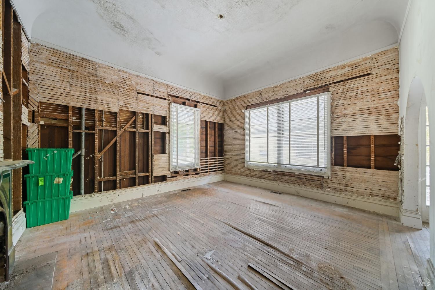 226 Bayview Street San Rafael, CA 94901 - Photo 9 of 57 an empty room with wooden floor and windows