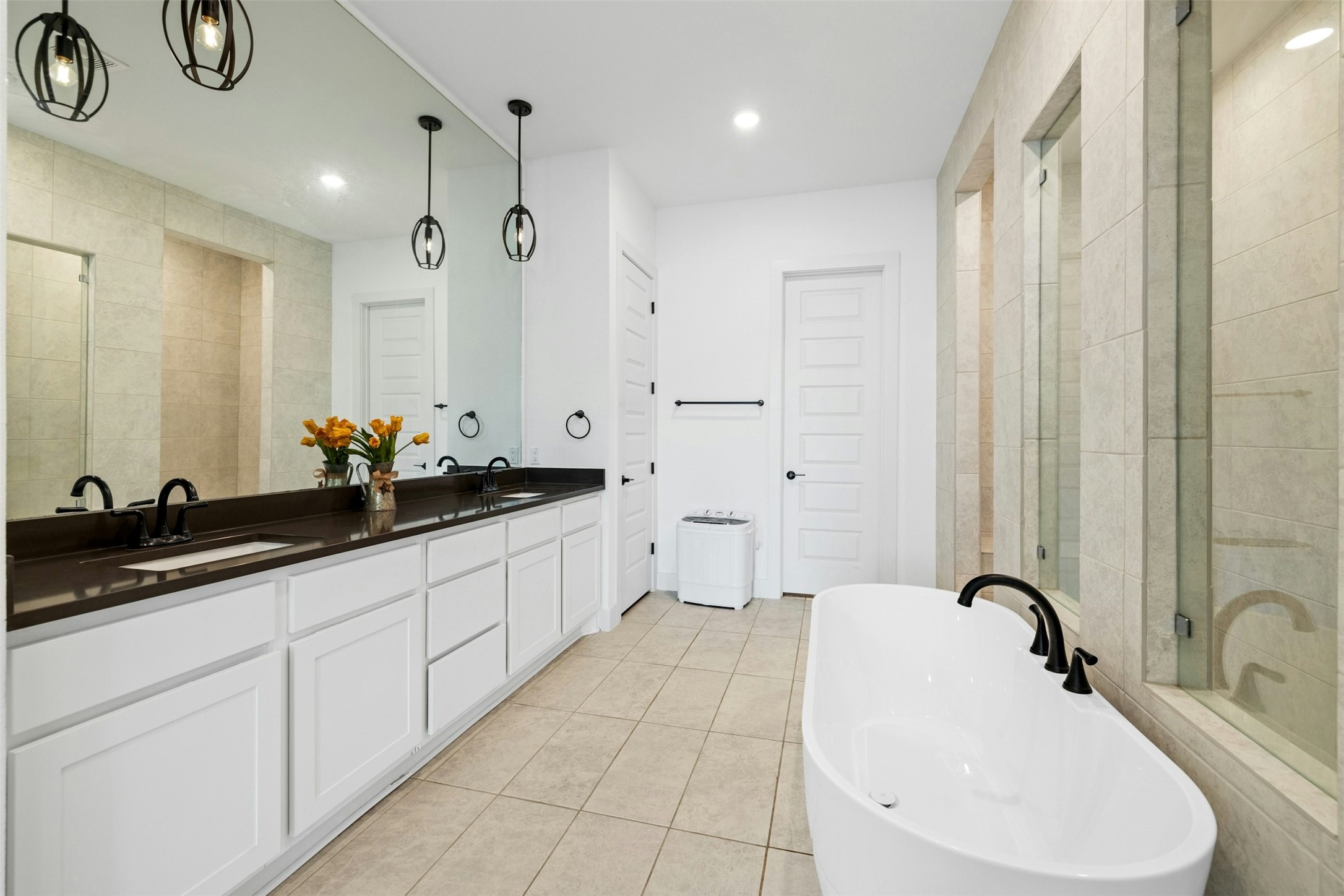 172 Shady Hl Loop Liberty Hill, TX 78642 - Photo 17 of 30 a bathroom with a sink and a mirror