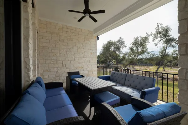 a balcony with furniture