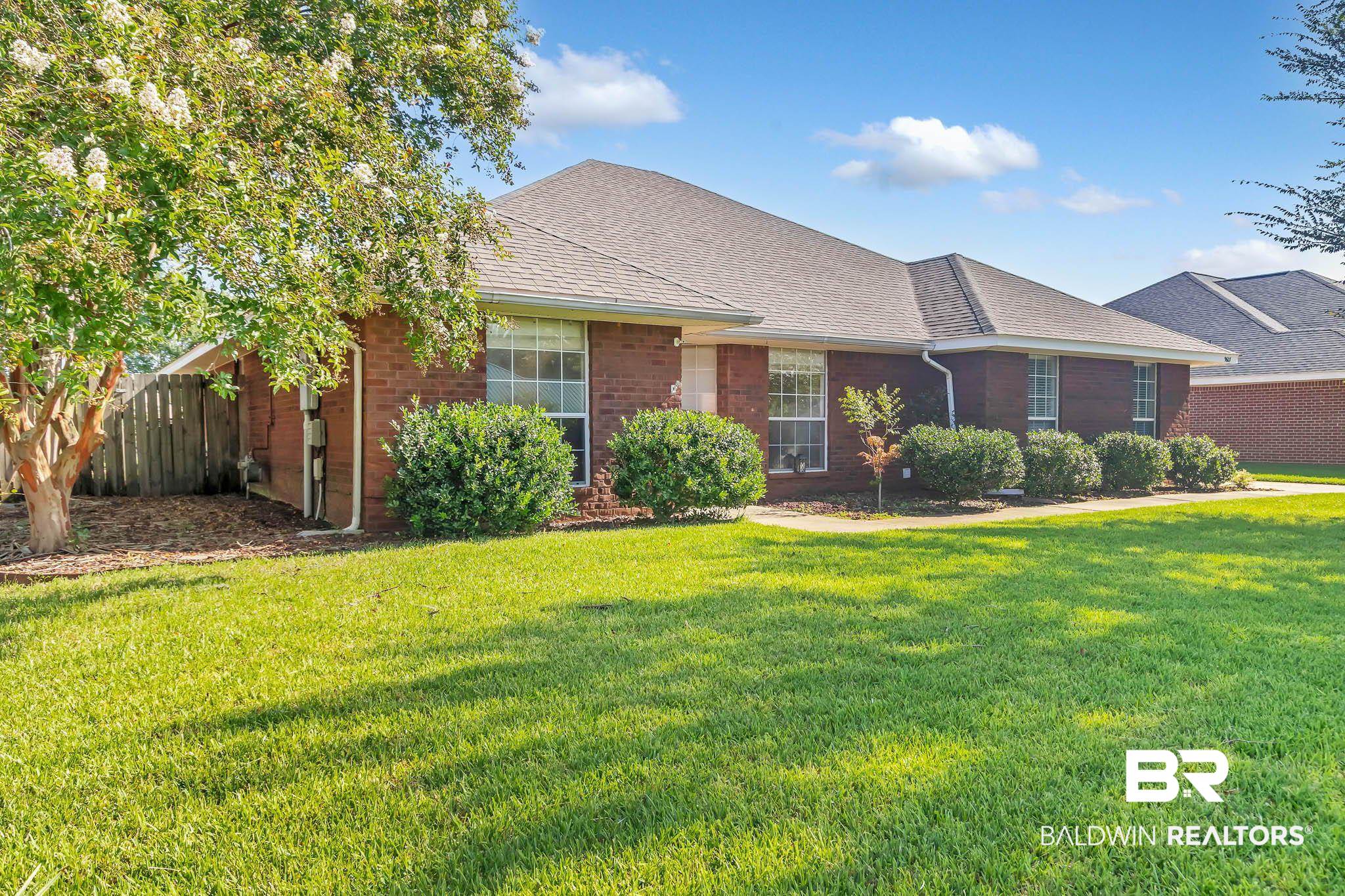 9607 Czar Court Fairhope, AL 36532 - Photo 6 of 42 View of front of house with brick siding and roof with shingles