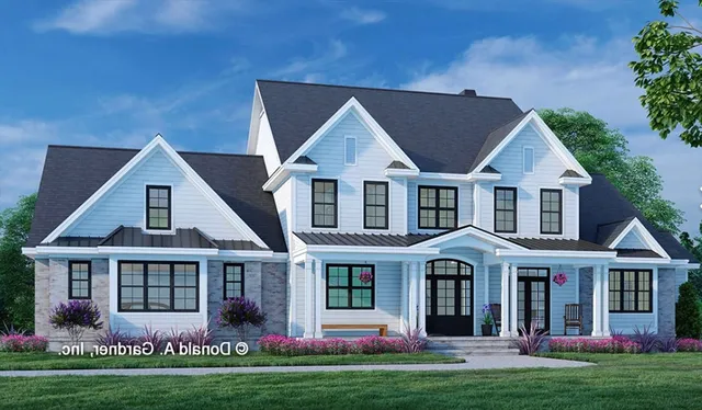 front view of a house with a yard