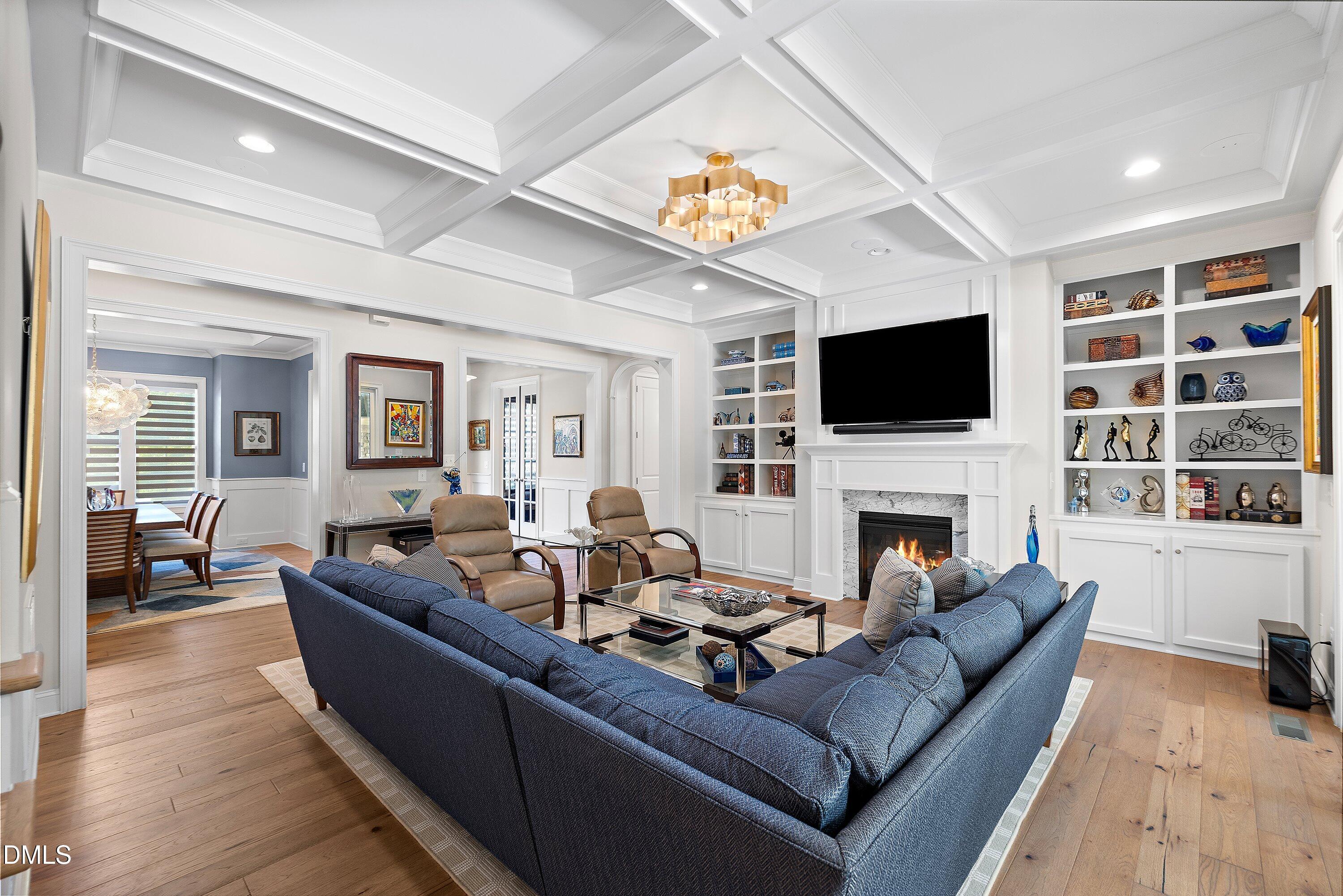 1536 Rock Dove Way Raleigh, NC 27614 - Photo 16 of 100 a living room with furniture a fireplace and a flat screen tv