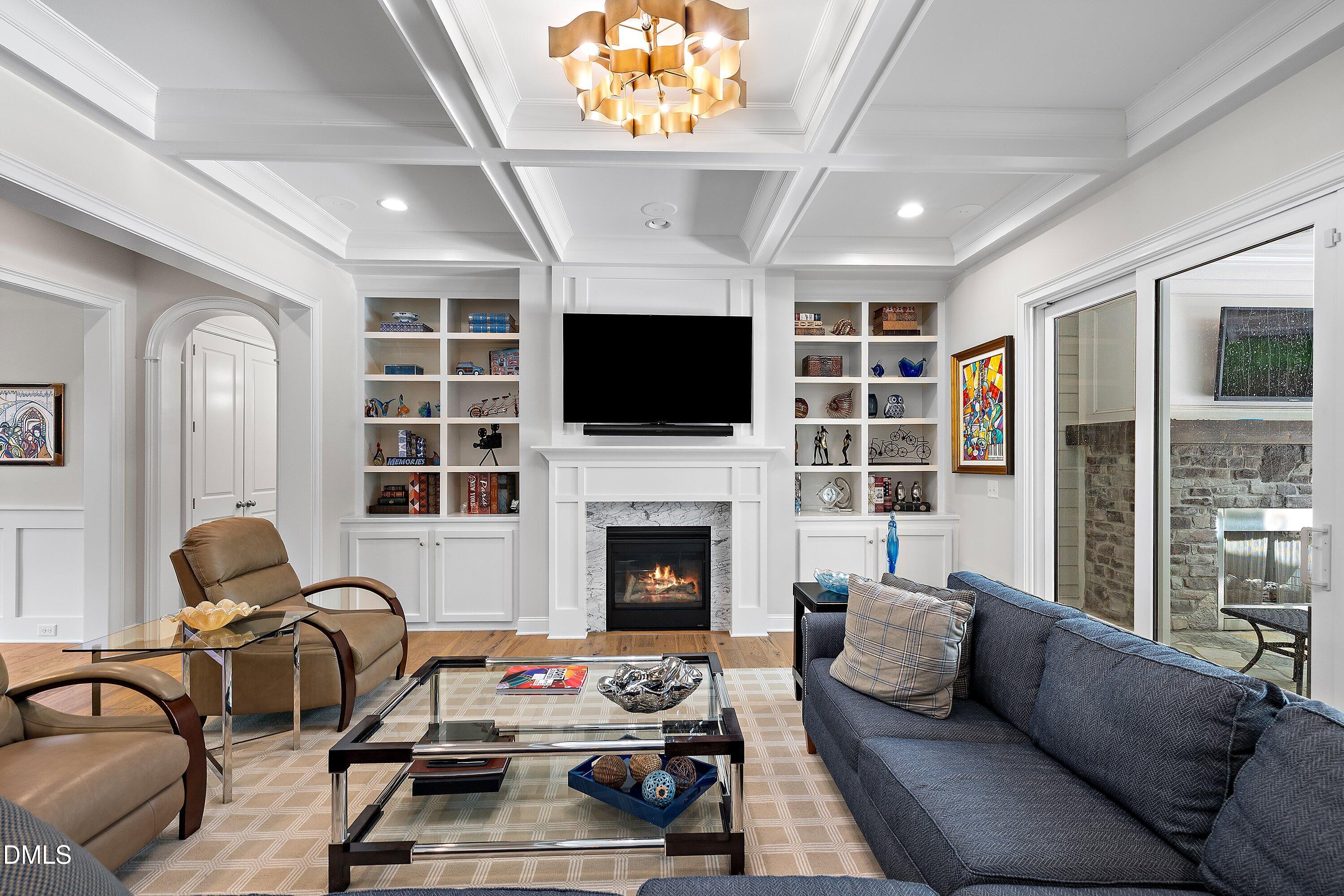 1536 Rock Dove Way Raleigh, NC 27614 - Photo 17 of 100 a living room with furniture a fireplace and a flat screen tv
