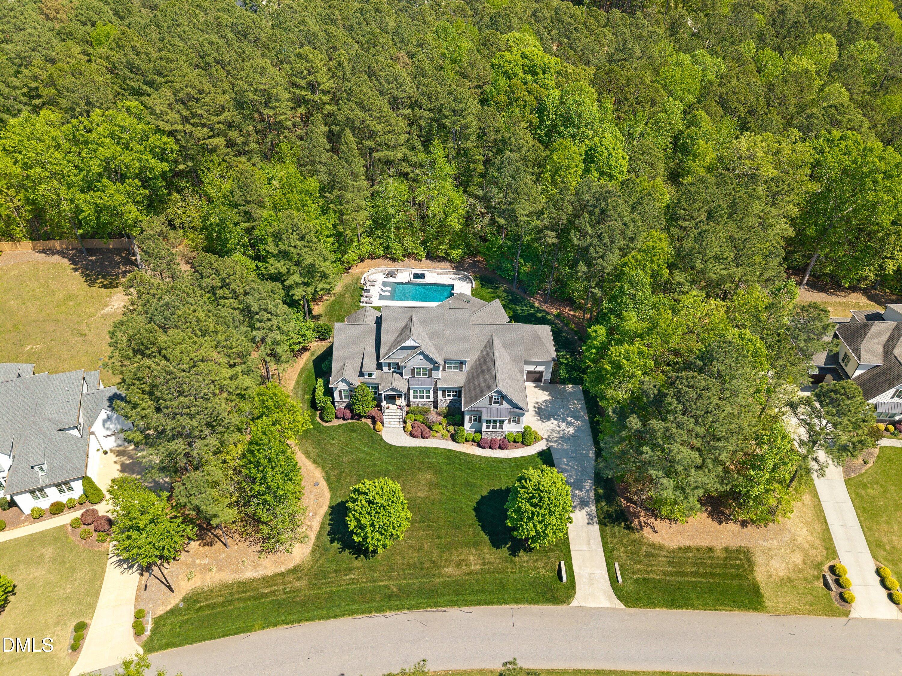1536 Rock Dove Way Raleigh, NC 27614 - Photo 3 of 100 an aerial view of a house with a garden and trees