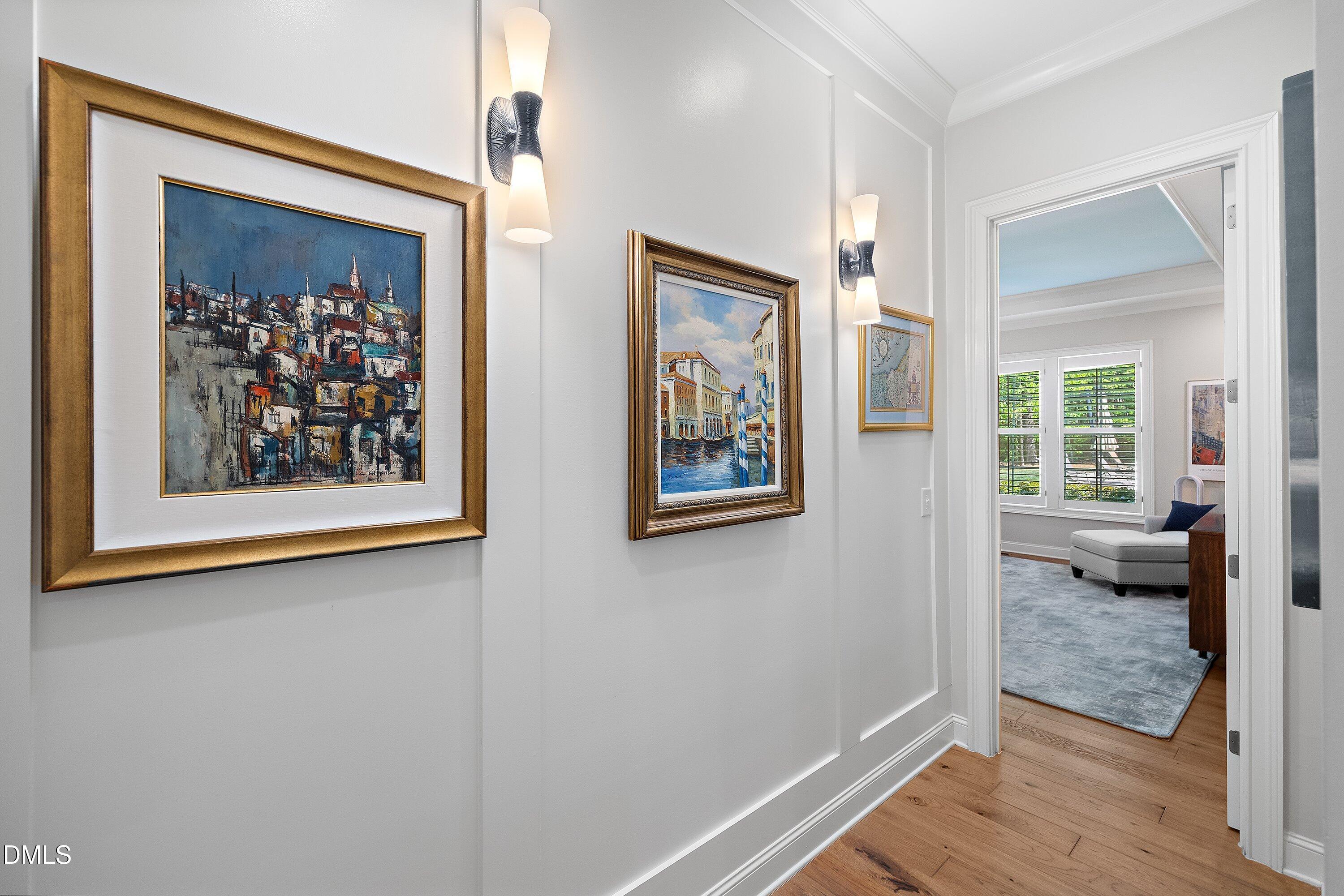 1536 Rock Dove Way Raleigh, NC 27614 - Photo 47 of 100 a view of a hallway with wooden floor and a bedroom