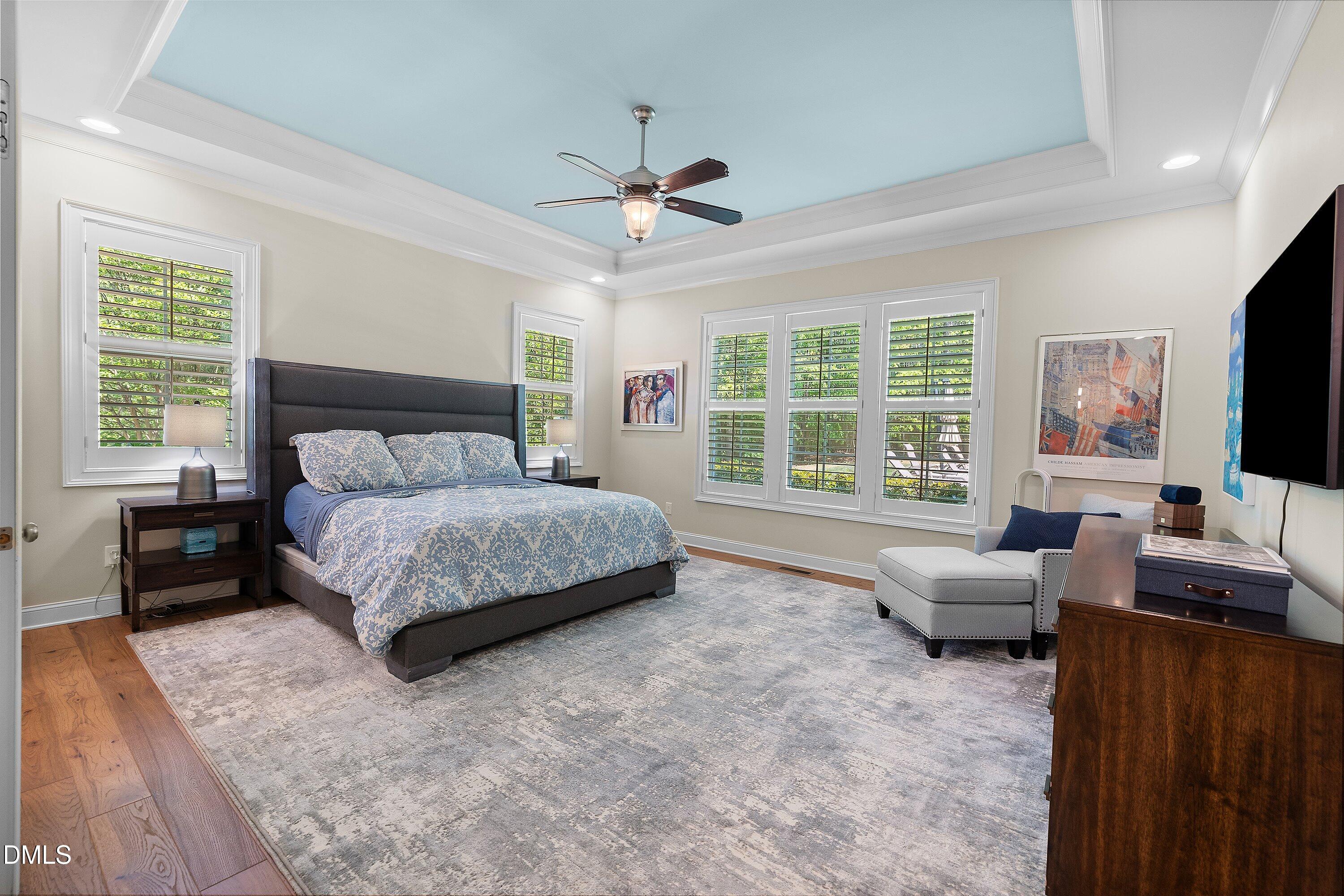 1536 Rock Dove Way Raleigh, NC 27614 - Photo 48 of 100 a bedroom with a bed and a couch