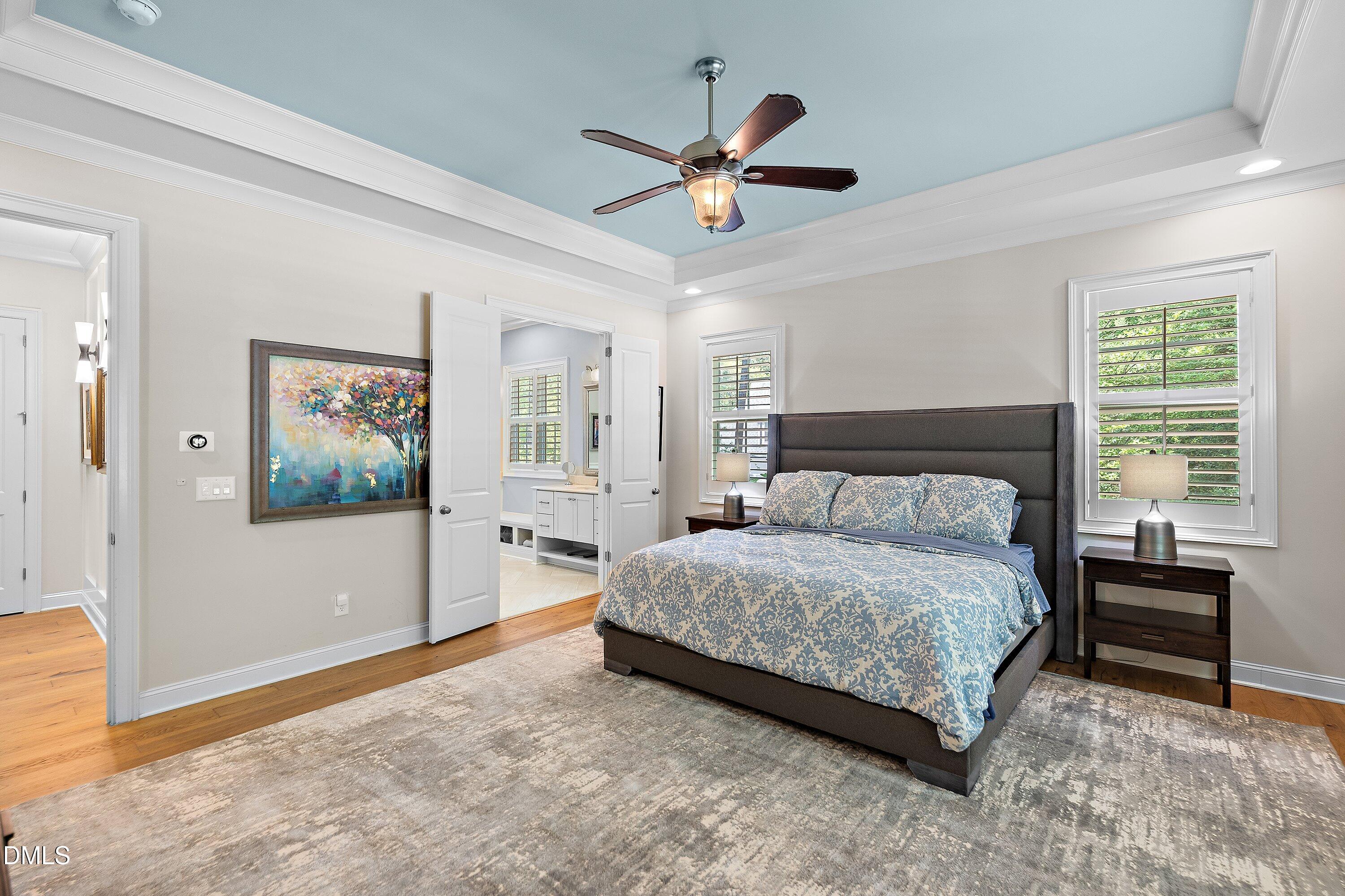 1536 Rock Dove Way Raleigh, NC 27614 - Photo 50 of 100 a bedroom with a bed and a painting on the wall
