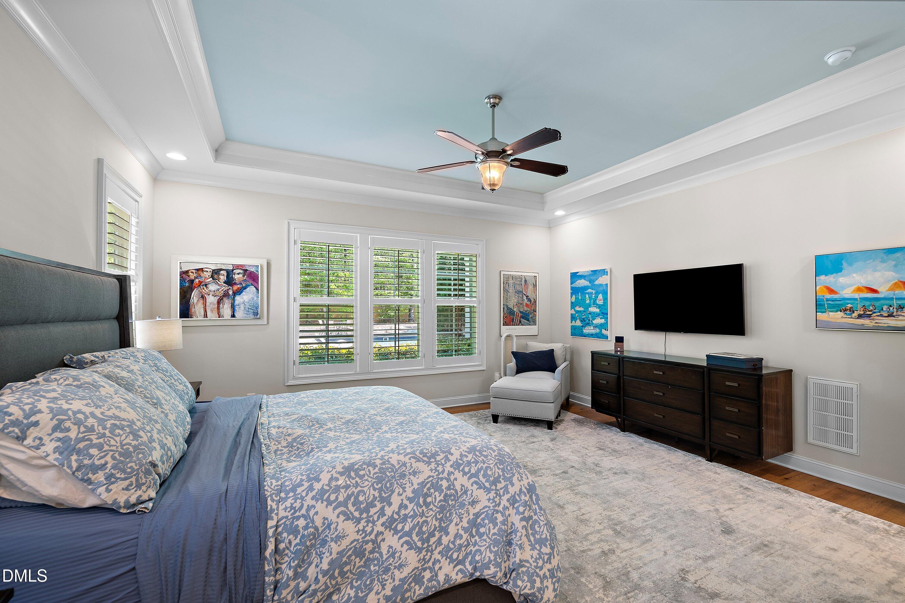 1536 Rock Dove Way Raleigh, NC 27614 - Photo 52 of 100 a living room with furniture and a flat screen tv