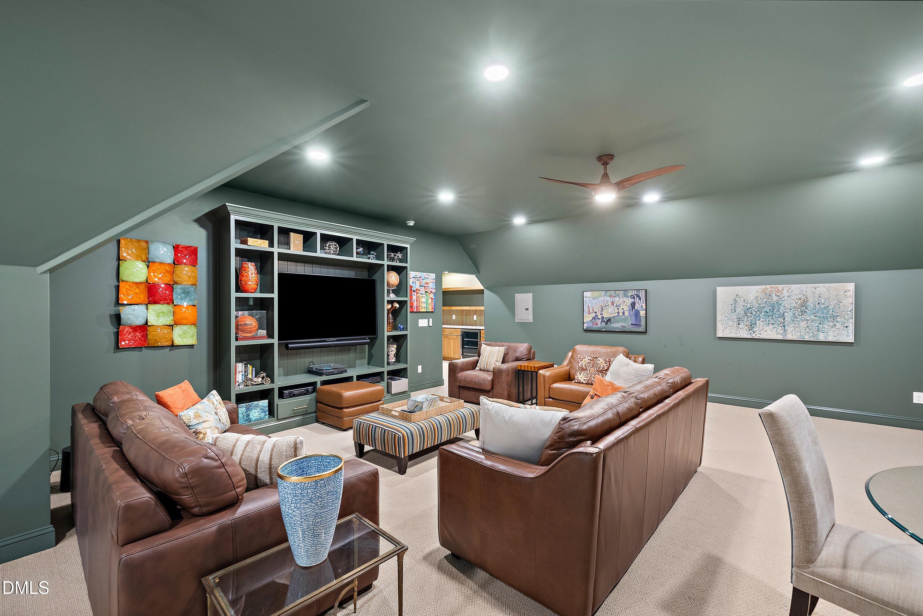 1536 Rock Dove Way Raleigh, NC 27614 - Photo 68 of 100 a living room with furniture and a flat screen tv