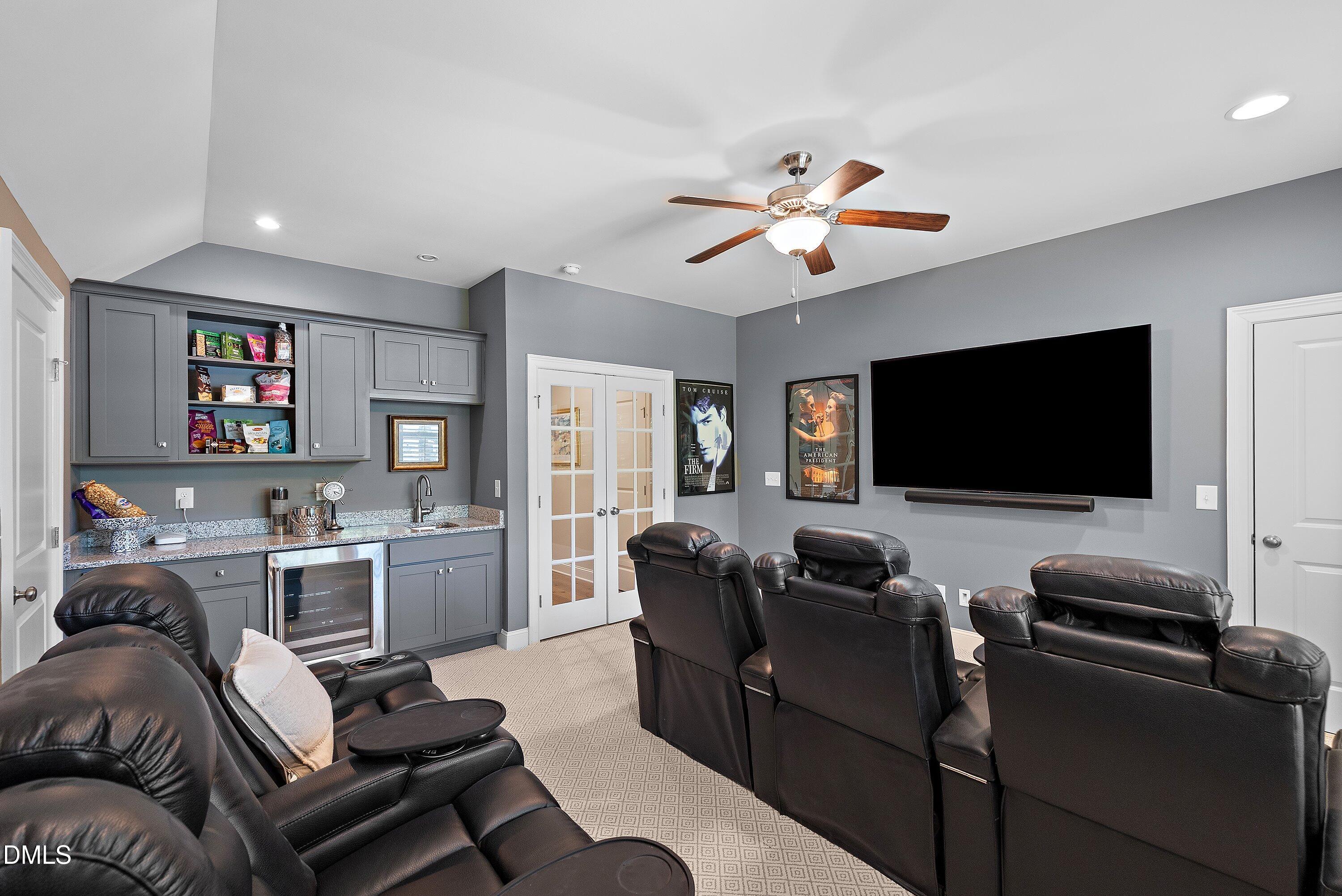 1536 Rock Dove Way Raleigh, NC 27614 - Photo 80 of 100 a living room with furniture and a flat screen tv