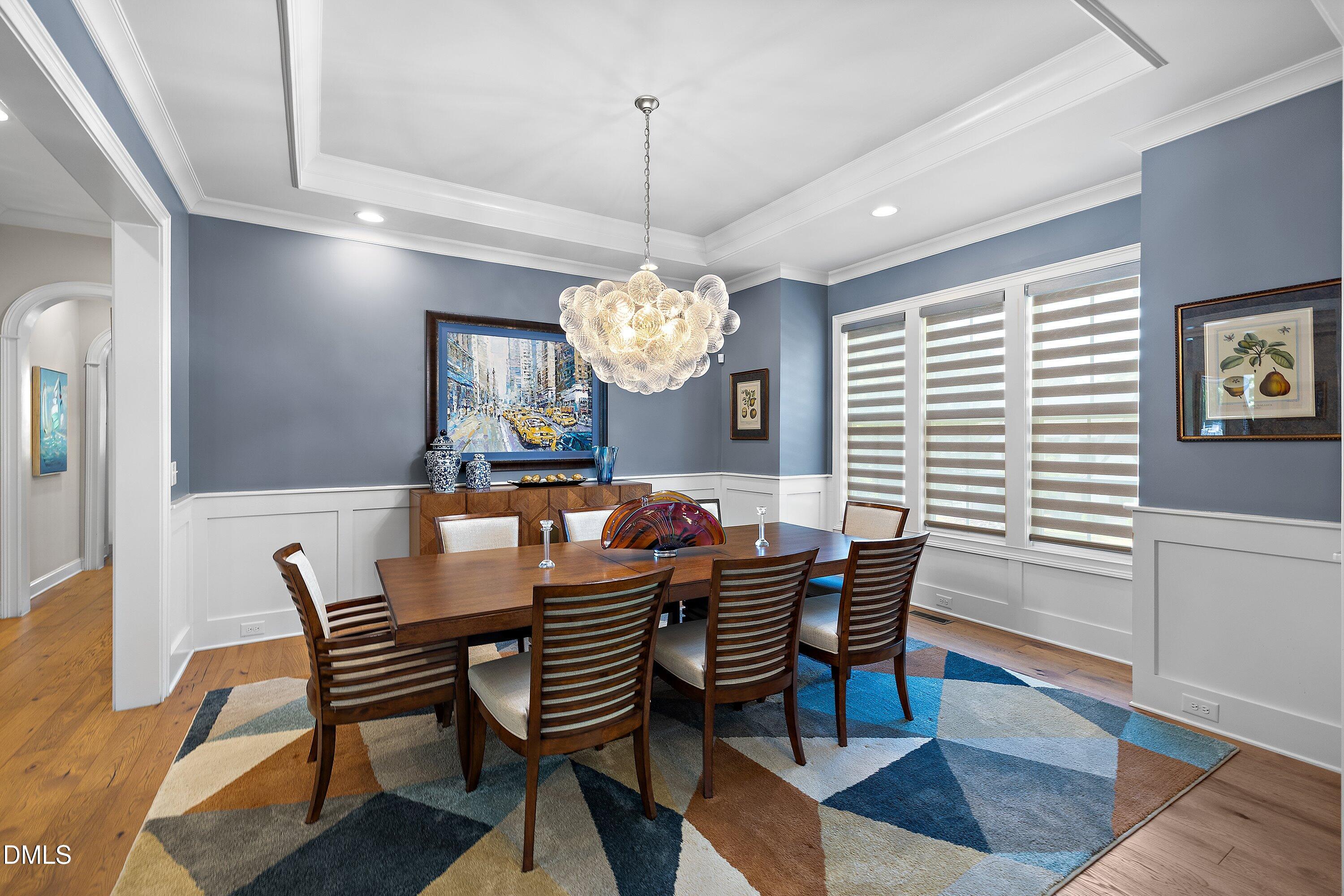1536 Rock Dove Way Raleigh, NC 27614 - Photo 8 of 100 a view of a dining room with furniture window and wooden floor