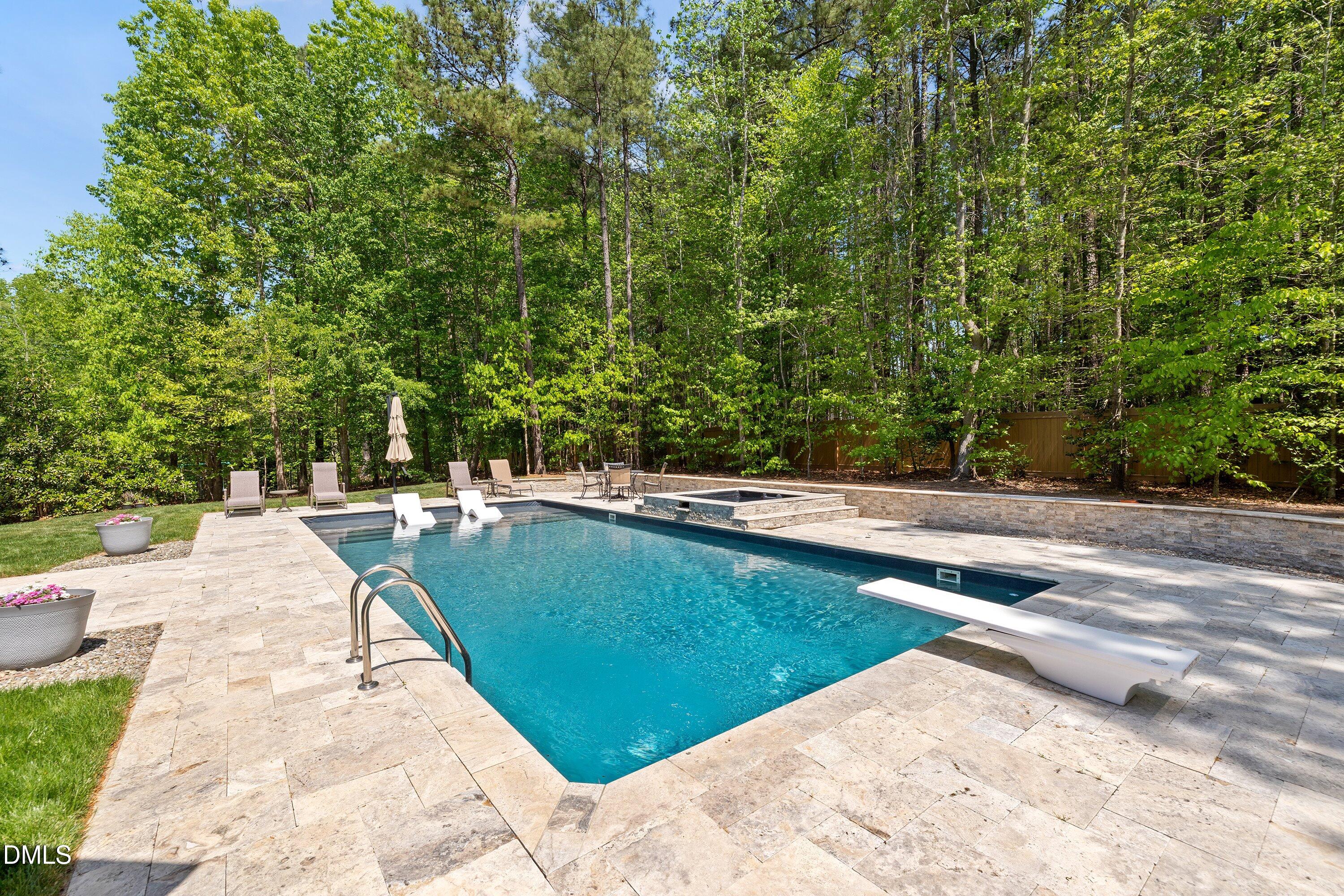 1536 Rock Dove Way Raleigh, NC 27614 - Photo 84 of 100 a view of a swimming pool with a patio