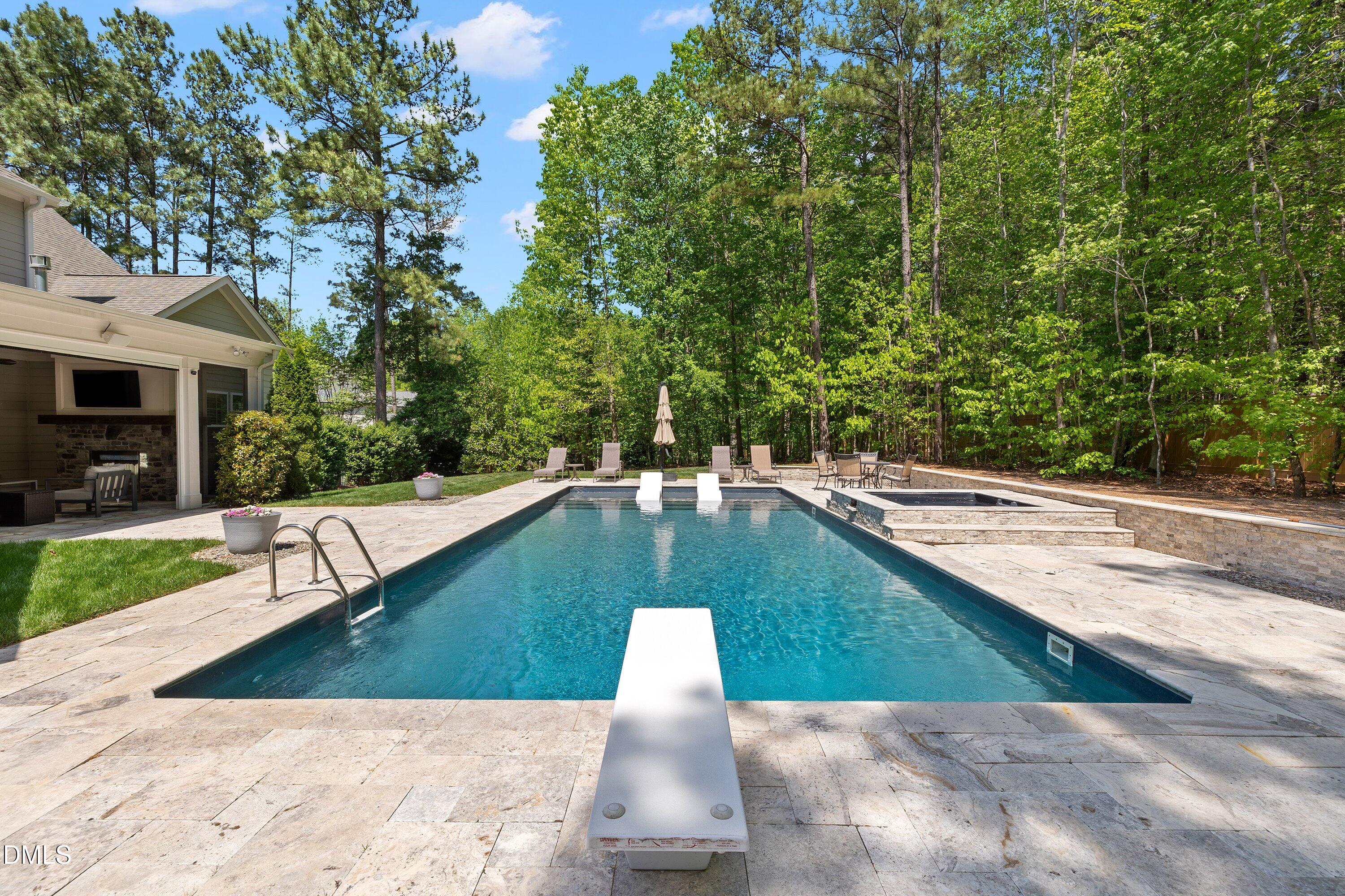 1536 Rock Dove Way Raleigh, NC 27614 - Photo 85 of 100 a view of a swimming pool with a patio