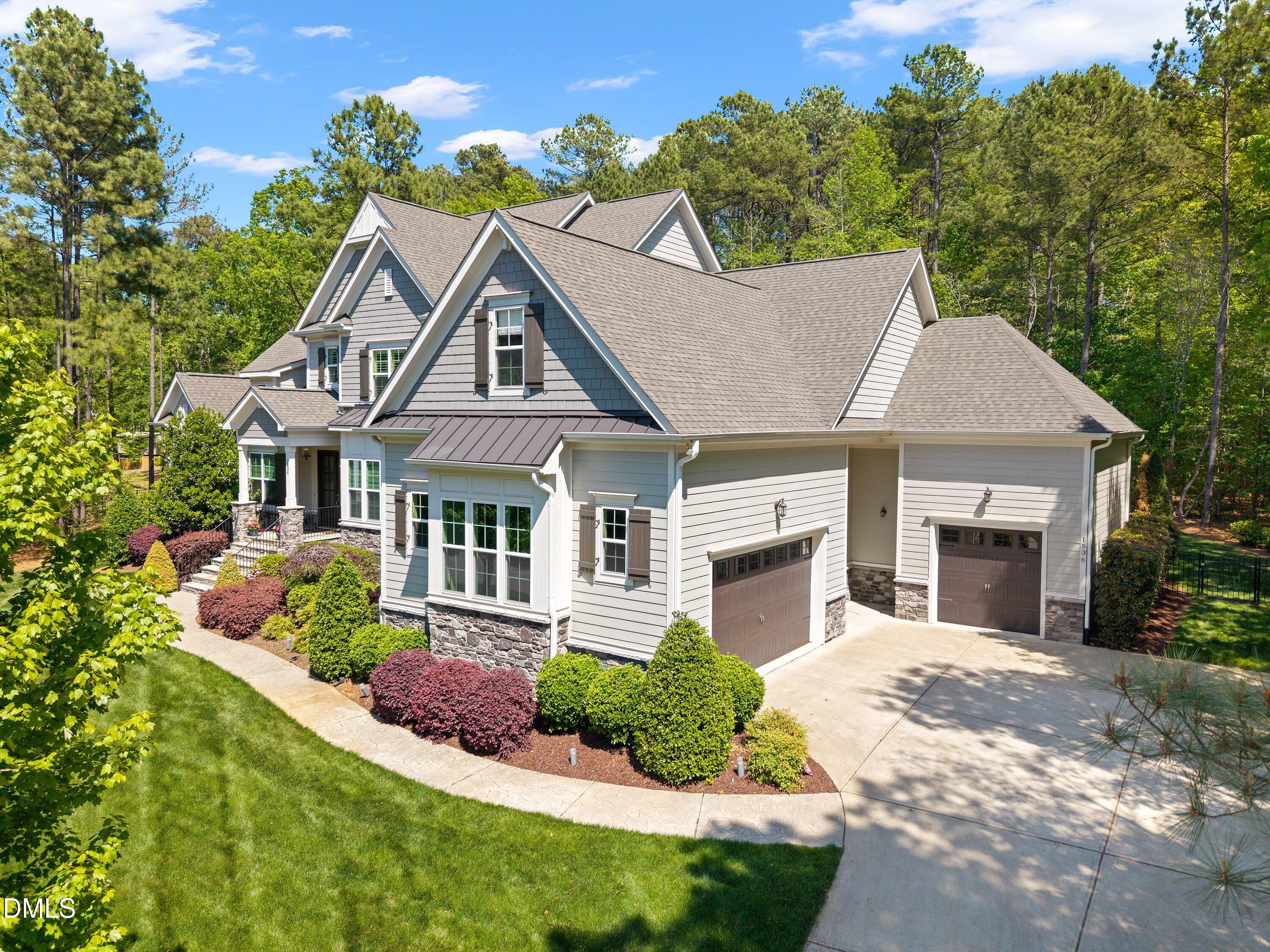 1536 Rock Dove Way Raleigh, NC 27614 - Photo 95 of 100 a front view of a house with a porch